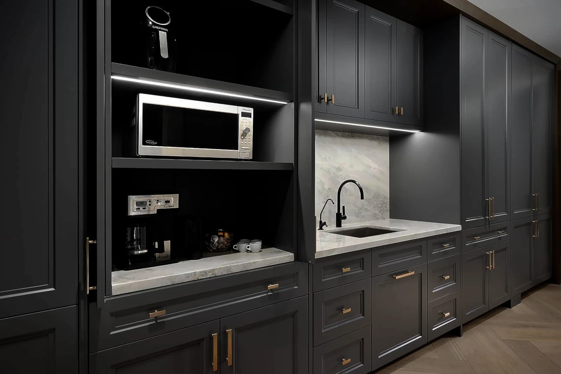 Beautiful kitchen with professionally refinished cabinets by Maco Painting