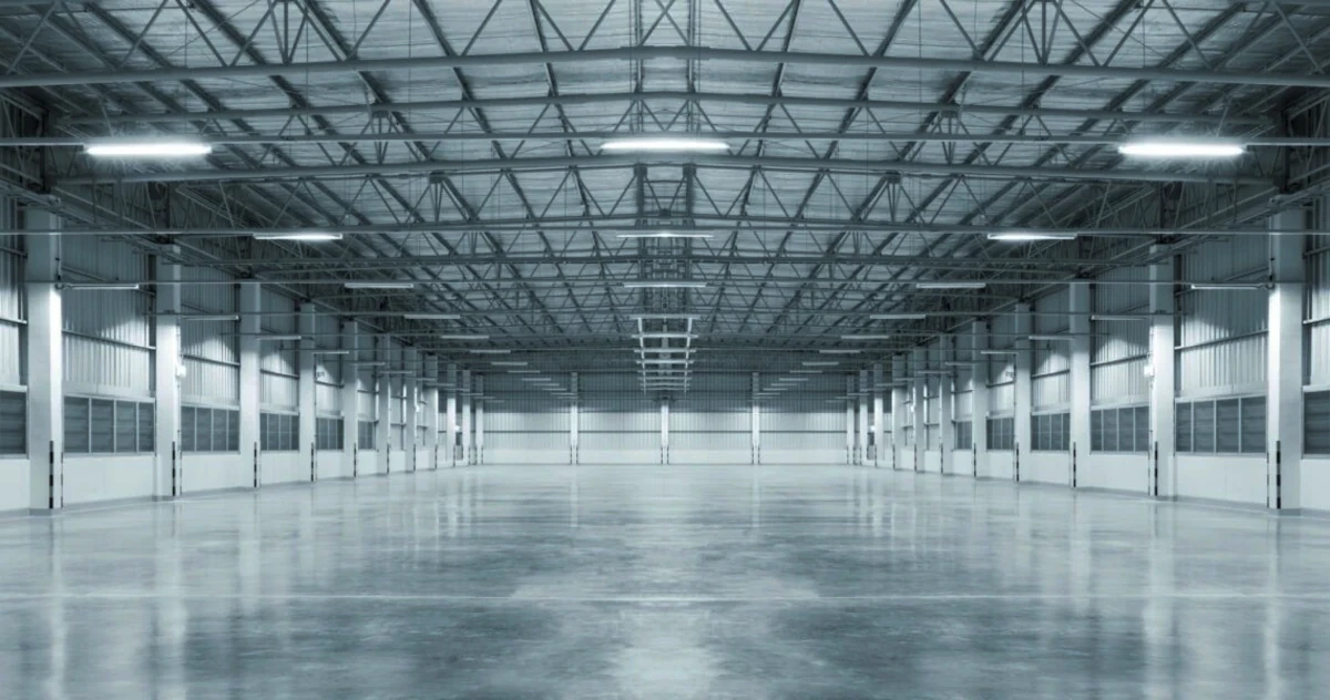 Industrial warehouse with painted ceiling and walls by Maco Painting