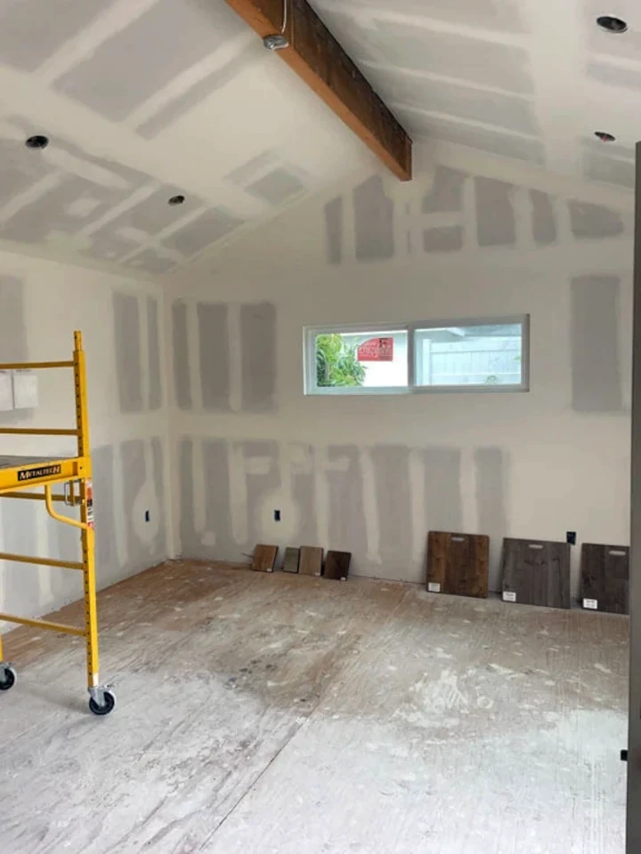 Professional drywall repair in progress showing Maco's attention to detail