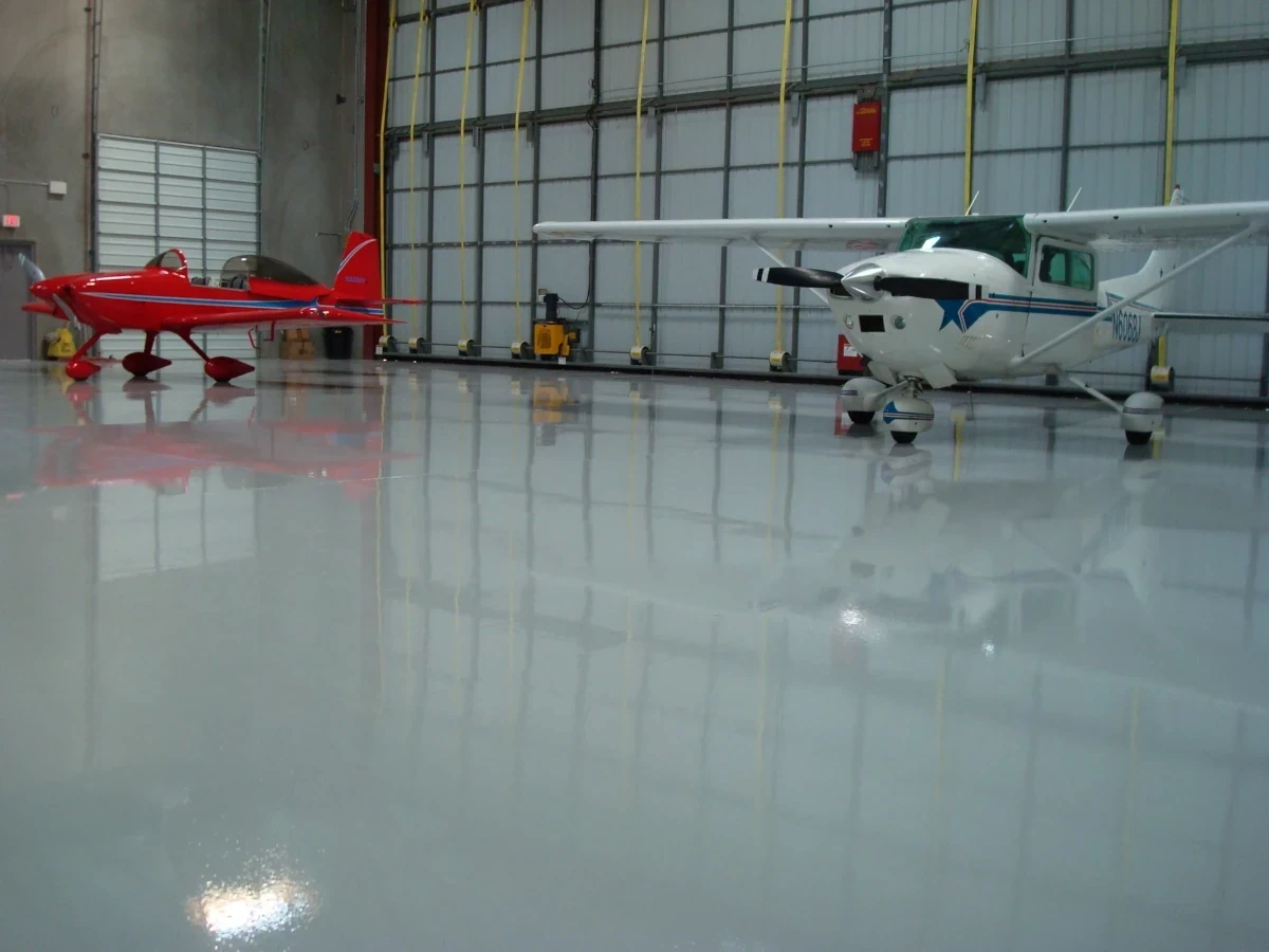 Aircraft warehouse with durable epoxy flooring