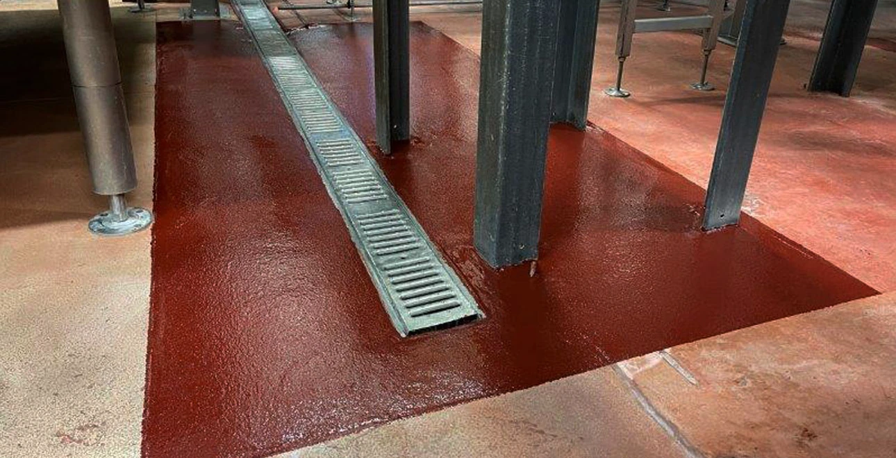 Manufacturing facility with industrial-grade epoxy floor installation