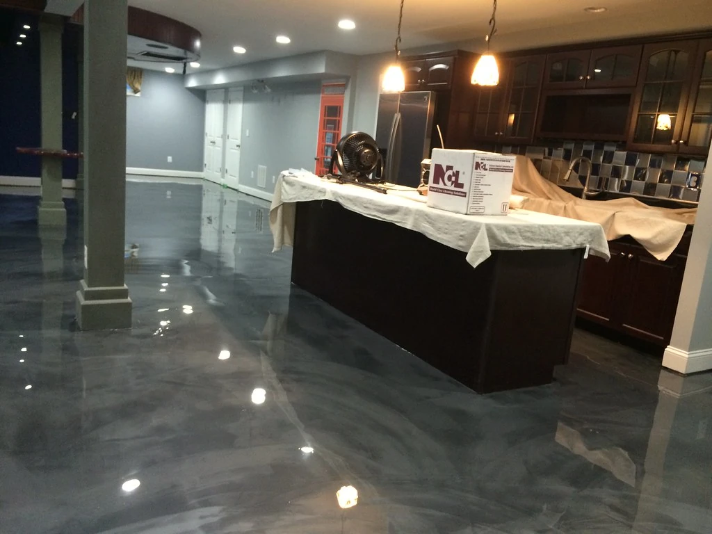 Sophisticated designs and colors using a metallic epoxy finish in basement