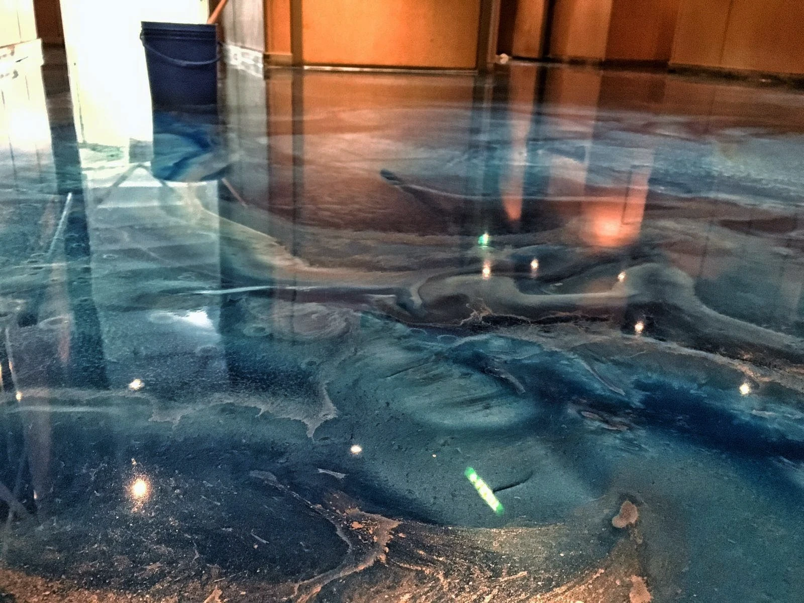 Stunning metallic blue epoxy with wave pattern