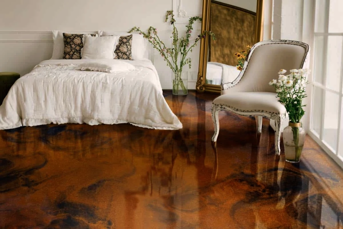 Elegant bedroom with copper-toned reflective epoxy flooring