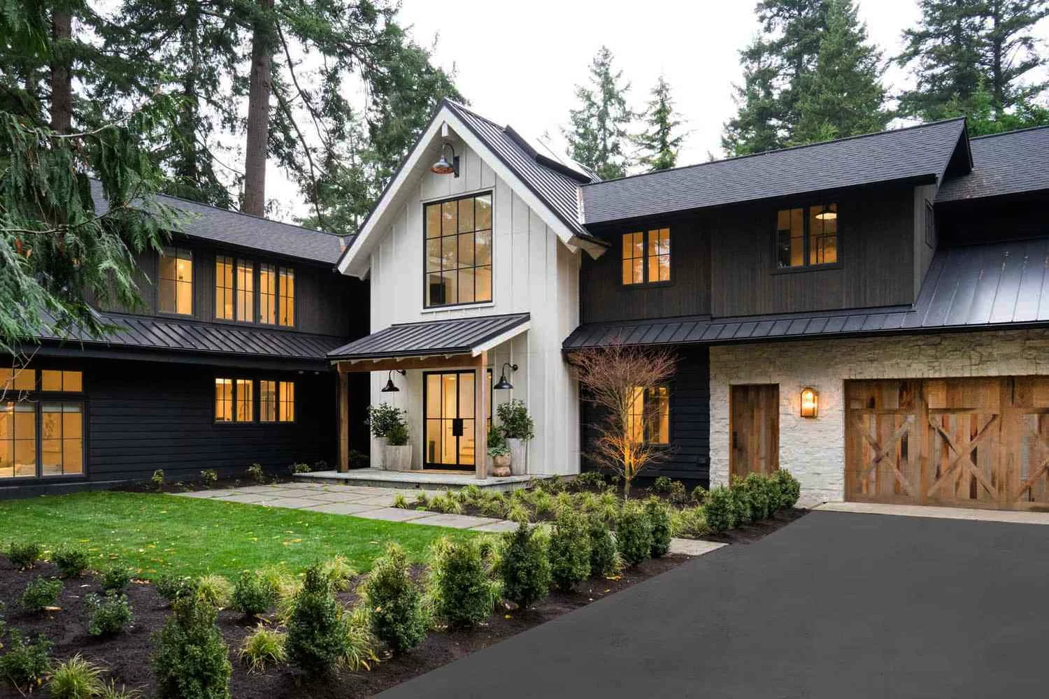 Modern home with stunning black and white exterior paint design